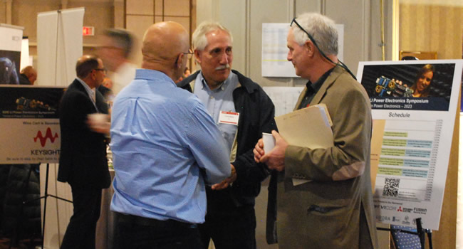 Colleagues and old friends catch up at the 2023 IEEE LI Power Electronics Symposium