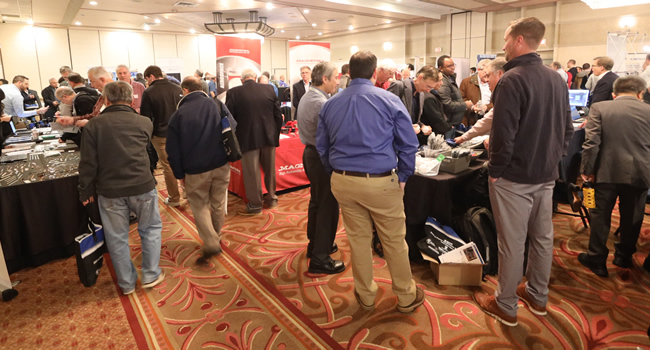 A packed exhibit floor at the 2023 IEEE LI Power Electronics Symposium