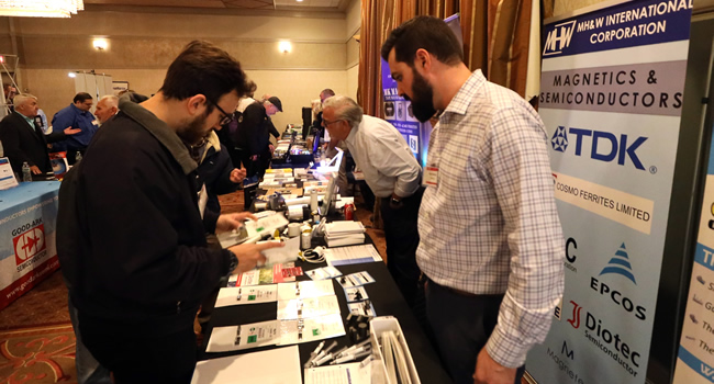 A packed exhibit floor at the 2023 IEEE LI Power Electronics Symposium