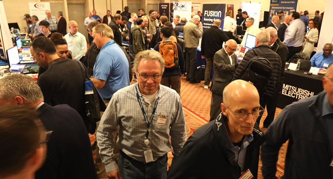 A packed exhibit floor at the 2023 IEEE LI Power Electronics Symposium